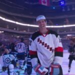 Jesse Pollock tries to shoot harder than the Winnipeg Jets