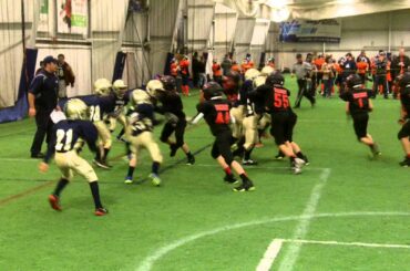 Pete Jurovich, Carlie Harris and Tyler Boucher combine to stop pivotal conversion