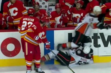 Tyler Toffoli hits Rickard Rakell before line change