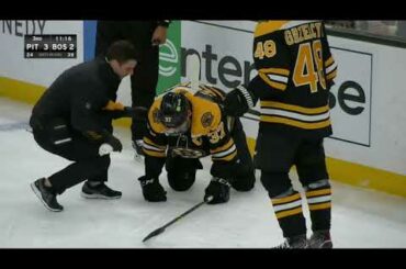 Patrice Bergeron shaken up after contact with Sidney Crosby