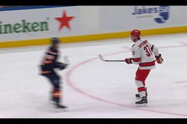 Alex Romanov jumps at Andrei Svechnikov, both got penalties (21 jan 2023)