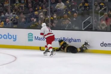 Charlie McAvoy tripped by Jesper Fast, while Patrice Bergeron got clipped by Ian Cole's stick