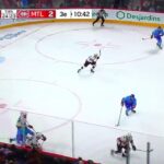 Nick Suzuki with a big hit on Nikita Zaitsev