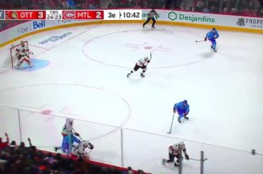 Nick Suzuki with a big hit on Nikita Zaitsev