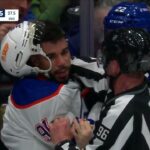 Evander Kane comes after Jake McCabe during a scrum between the Oilers and Maple Leafs