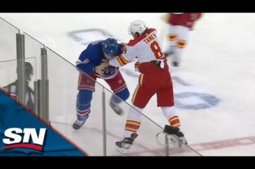 Flames' Chris Tanev Scraps With Rangers' Jacob Trouba After Hit On Dillon Dube