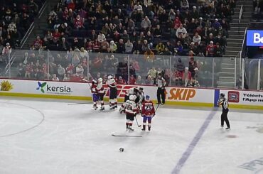 Laval Rocket's Xavier Simoneau and Belleville Senators' Jonathan Aspirot get into a brief fight 3/8