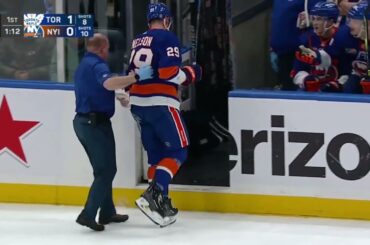 Brock Nelson hit into the boards by Noel Acciari