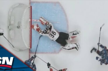 John Gibson Dives Back To Cover Loose Puck Long Enough To Make Save