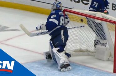 Slavin Sneaks Puck Over Vasilevskiy's Shoulder With Precise Shot