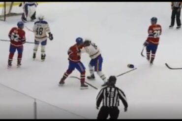 Juraj Slafkovsky big hit by Zach Berzolla