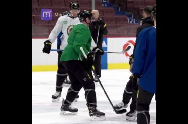 JT Miller and Nils Aman practice face off