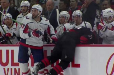 Tom Wilson hits Niederreiter into the Capital's bench
