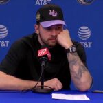 Luka Doncic talks with the media after loss to the Spurs