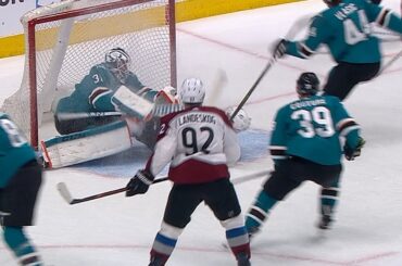 Martin Jones kicks out his pad to deny Nathan MacKinnon