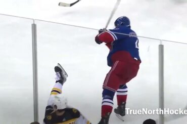 Braden Schneider delivers a massive hit on Trent Frederic, causing a big scrum