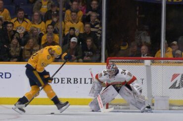 Austin Watson strikes with nifty between-the-legs redirect