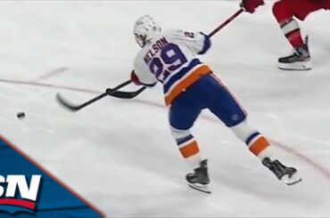 Islanders' Brock Nelson Fights Off Hit Before Firing It Past Hurricanes' Antti Raanta