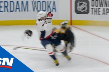 Alexander Ovechkin Sends Brad Marchand Flying With Massive Crunch