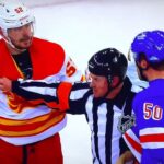 Milan Lucic takes a huge hit by Sammy Blais a fight and a scrum ensues