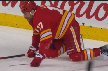 Milan Lucic Humorously Struggles To Get To Bench After Losing Skate Blade