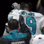Couture exits after taking deflected Burns shot to face