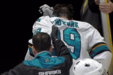 Couture exits after taking deflected Burns shot to face