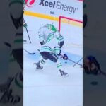 #89 Frederick Gaudreau passes to #17 Marcus Foligno on the doorstep but he misses.