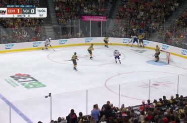 Kostin takes McNabb safely into the boards