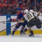 Leon Draisaitl clean check on Brett Howden