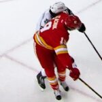 Tkachuk with a vicious elbow to the face of Doughty