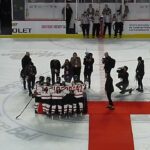 Canada captain Marie-Philip Poulin accepts trophy as Canada wins the Canada vs. USA Rivalry Series