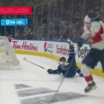 Matthew Tkachuk clean check on Mark Giordano