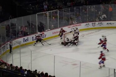 Belleville Senators' Marcus Hogberg does the splits to stop Laval Rocket's Riley Barber 9/28/19