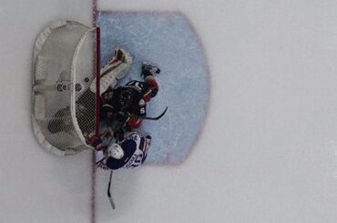 Gibson lets Caggiula shot slide through for early Oilers lead