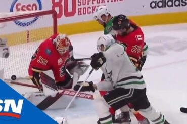 Joe Pavelski bats it home on the doorstep past Cam Talbot