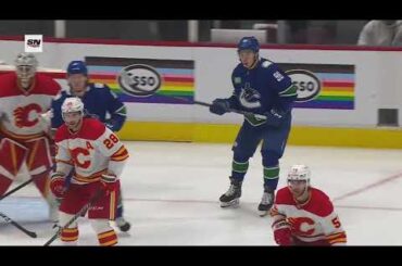 Andrei Kuzmenko gets assist on Pettersson's goal vs Flames (31 mar 2023)