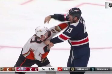 NHL. The first fight in the season for Tom Wilson vs Simon Benoit. Highlights