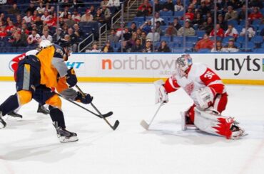 Girgensons dances around Kronwall for beauty