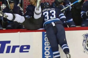 Byfuglien bulldozes Muzzin into the bench