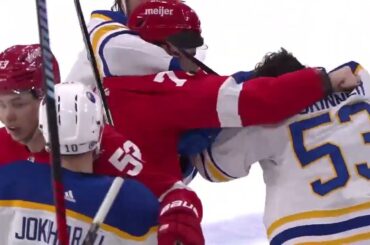 Buffalo Sabers and Detroit Red Wings scrum