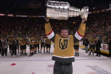 Ivan Barbashev receives the Stanley Cup from Jack Eichel after the finals (2023)