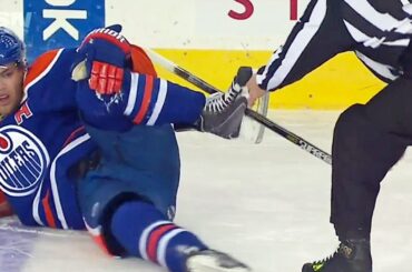 Stick gets caught in Taylor Hall's skate