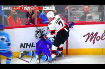 Brady Tkachuk hits Arber Xhekaj in the back and goes straight back to the bench