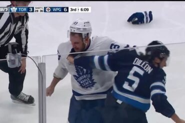 Kyle Clifford and Brenden Dillon drop the gloves