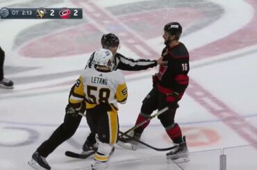 Kris Letang And Vincent Trocheck Engage Behind The Play