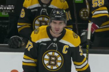 Marchand mugs Pitlick for late hit on Bergeron