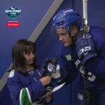 tom willander with canucks fan