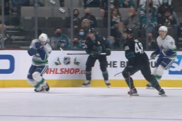 Vasily Podkolzin Takes A Puck To The Face After Erik Karlsson Attempts To Clear Zone