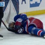 Zibanejad injured sliding hard into end boards feet first